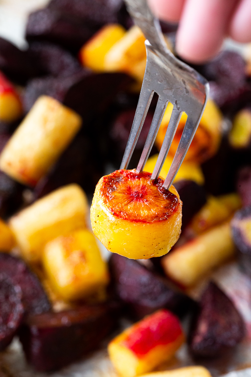 Roasted carrots and beets after oven roasting. 