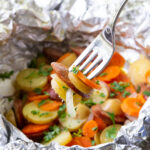 Sausage and potato foil packs, loaded with flavor.