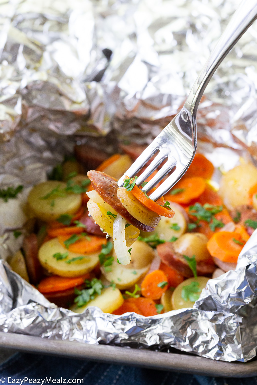 Sausage and potato foil packs, loaded with flavor.