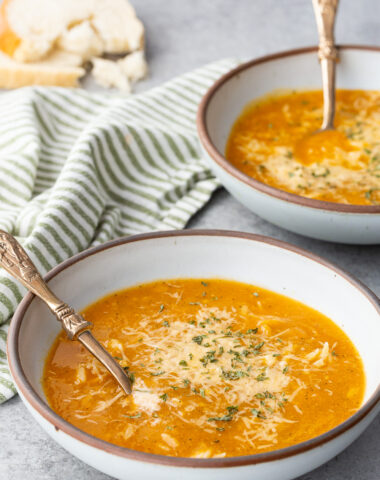 Two bowls of Italian orzo soup, a nourishing delicious soup