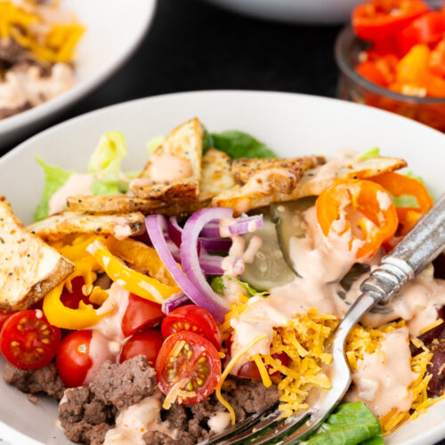 Burger bowl, a delicious deconstructed burger in a lettuce forward bowl