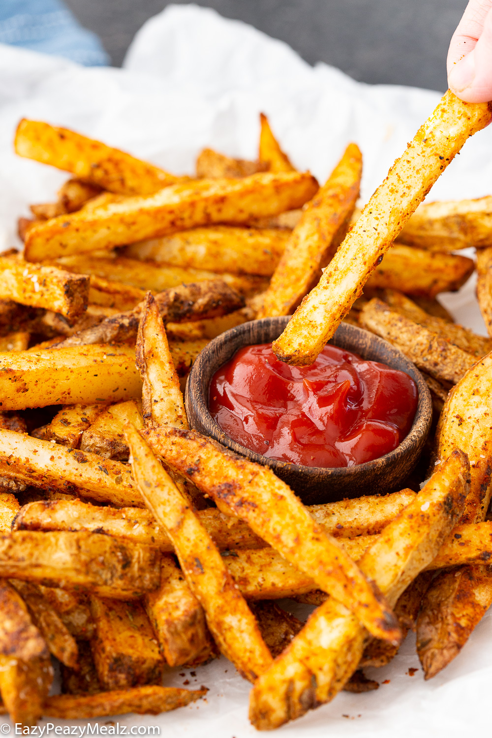 Delicious cajun fries, crispy fries cooked in the oven or air fryer. 