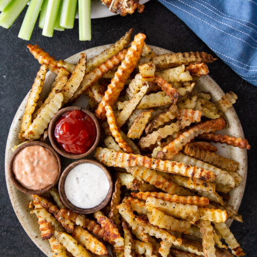 Crinkle cut fries cooked in the oven.