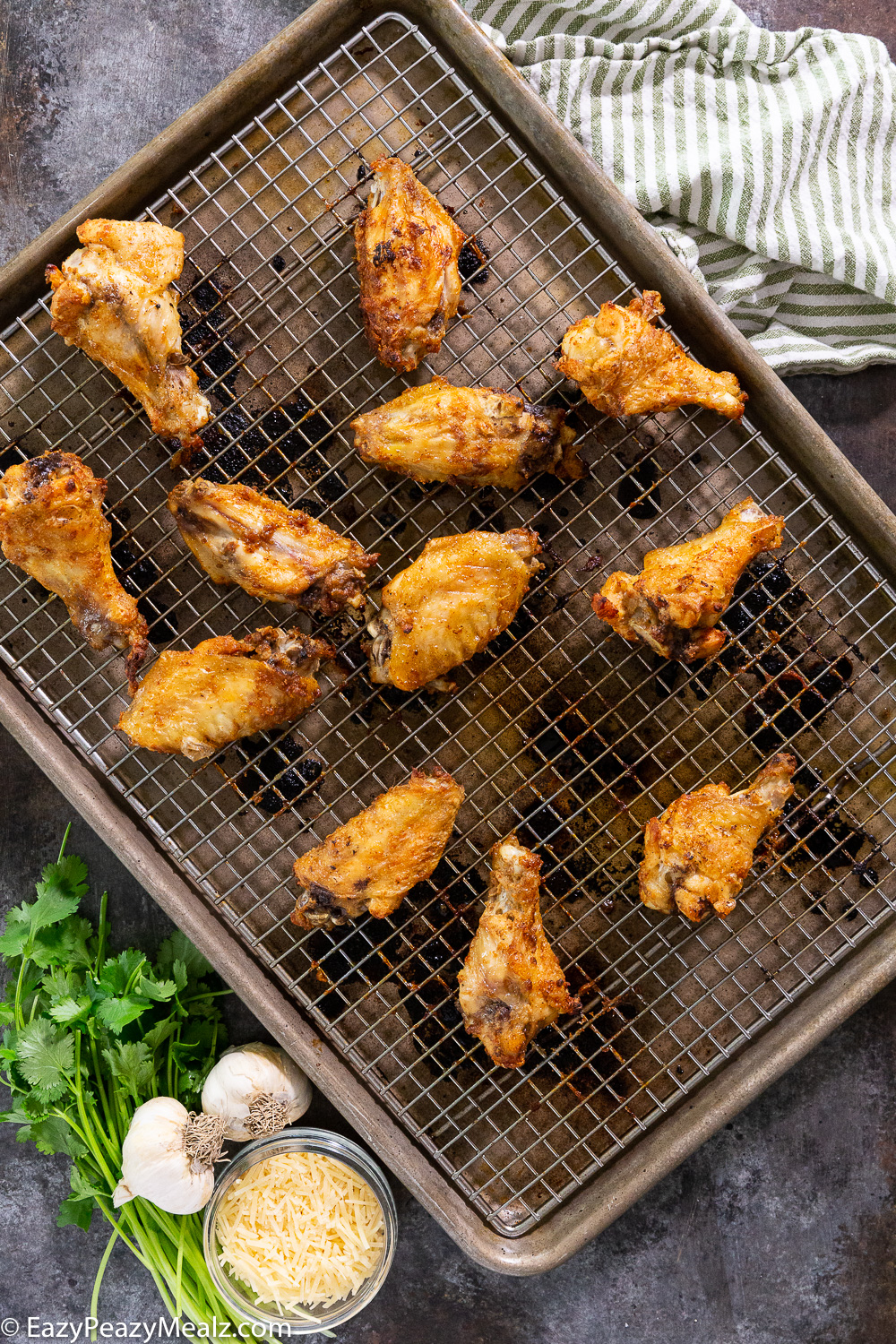 Making garlic parmesan chicken wings, these crispy baked wings are perfect for game day. 