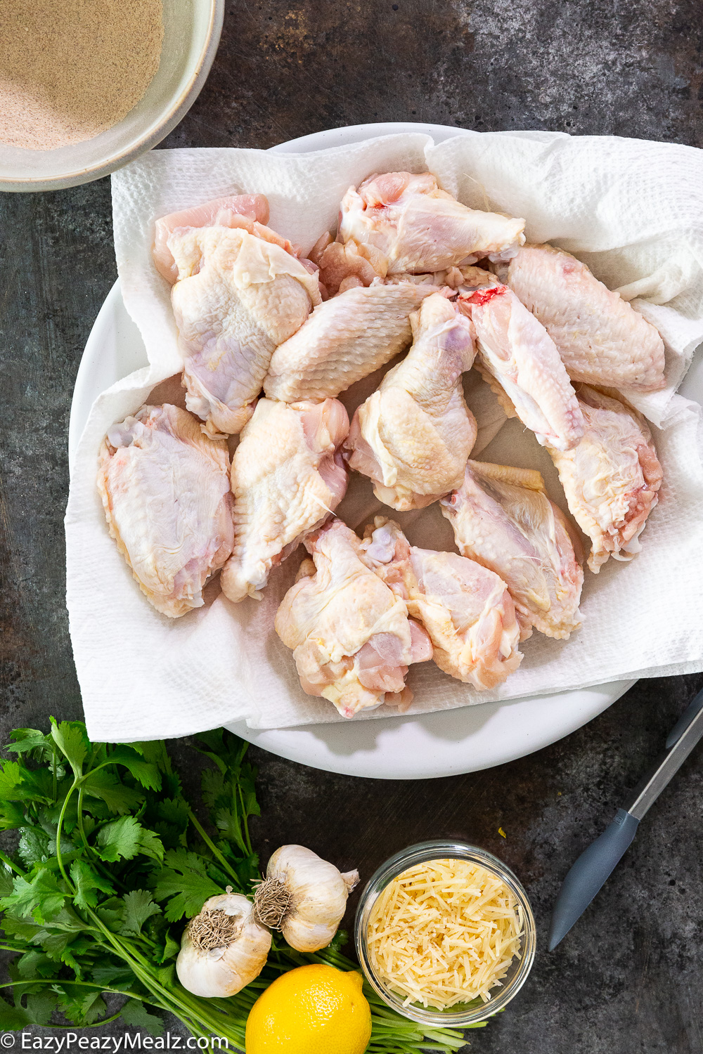 Drying wings to make super crispy and easy garlic parmesan wings. 