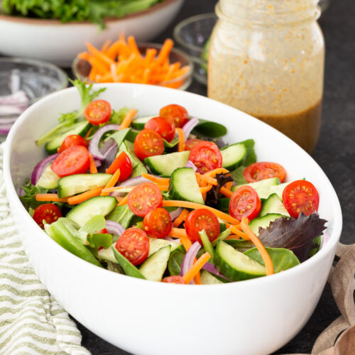 The perfect tossed green salad, perfect for accompanying protein.