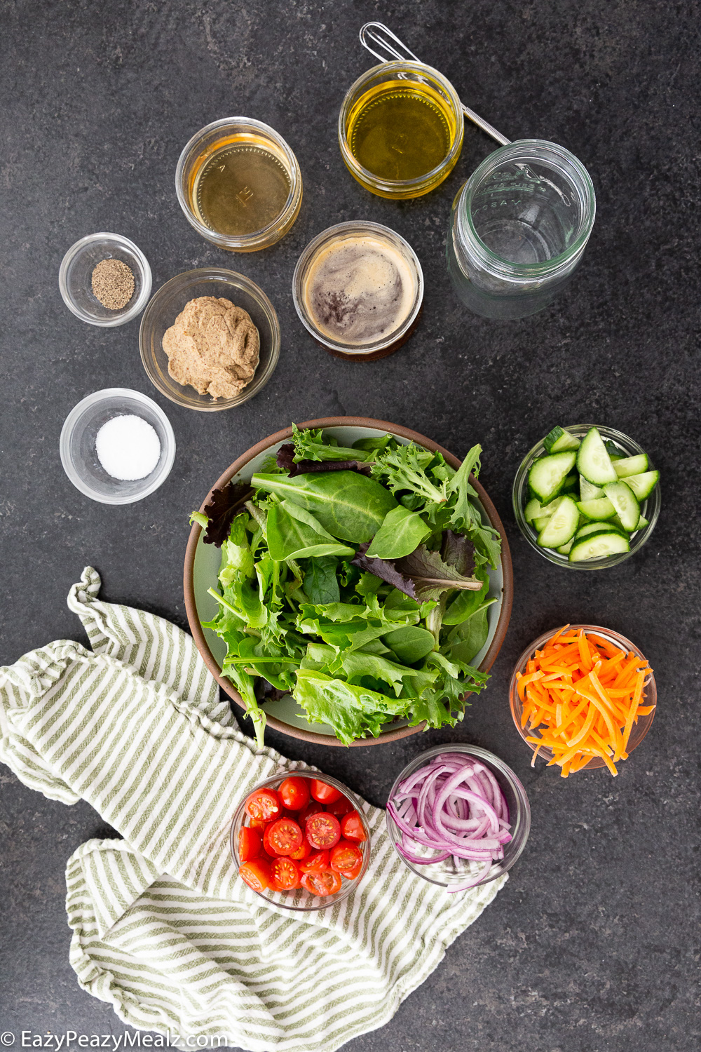 The ingredients needed for a tossed green salad with a basic vinaigrette. 