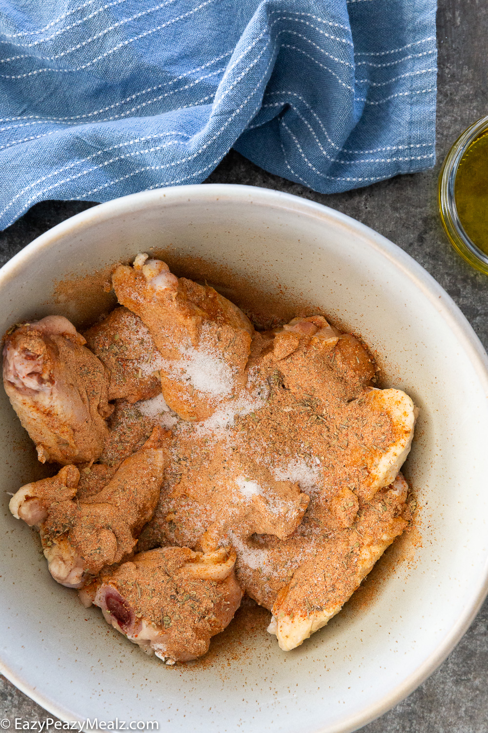 Cajun chicken wings, seasoned before baking. 