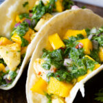 Juicy, delicious citrus marinated grilled halibut fish tacos with a chimichurri