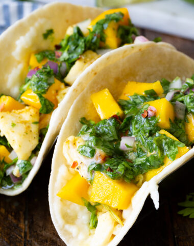 Juicy, delicious citrus marinated grilled halibut fish tacos with a chimichurri