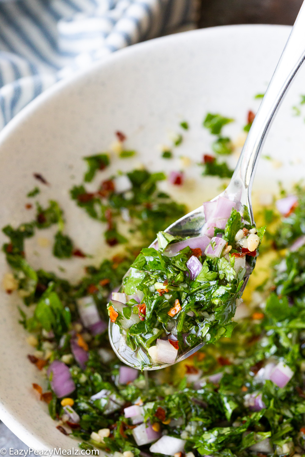 Grilled pork tenderloin topped with this simple chimichurri that adds mega flavor. 