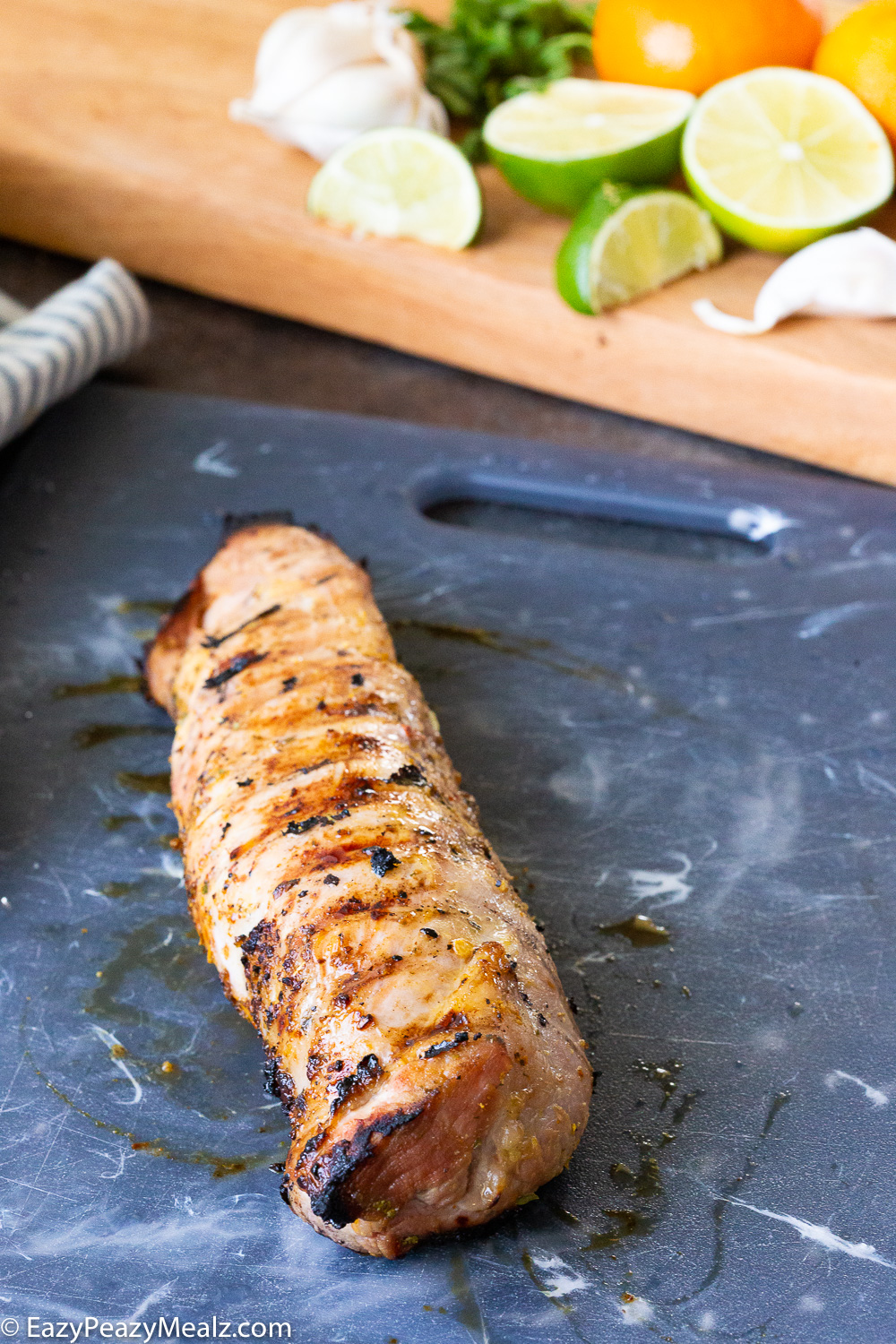 Grilled pork tenderloin, a mojo pork tenderloin grilled and topped with chimichurri