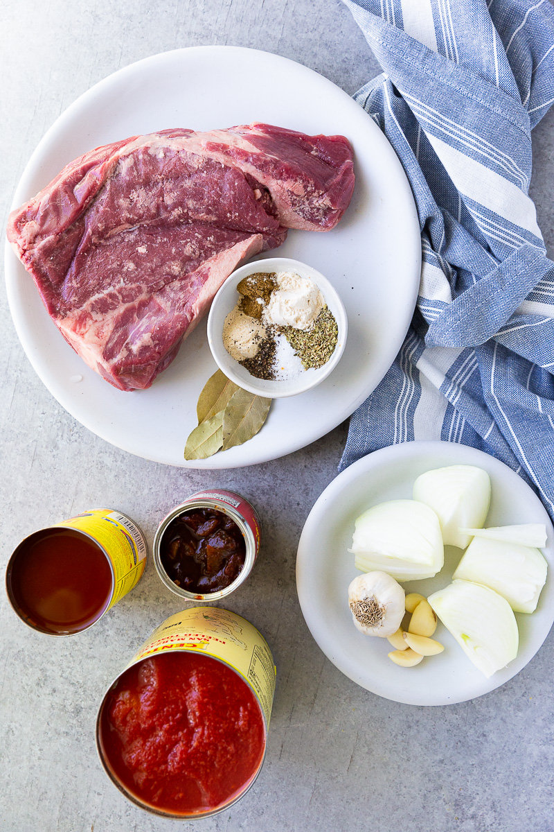Instant Pot Birria is a bold, rich, and deeply flavorful Mexican dish made faster and easier thanks to pressure cooking. Traditionally slow-simmered for hours, this shortcut version uses the Instant Pot to tenderize beef until it's fall-apart soft in a fraction of the time. The meat is cooked in a spiced broth made from dried chilies, garlic, onions, tomatoes, and warm, aromatic spices like cumin, oregano, and cinnamon. Once done, the beef is shredded and can be enjoyed in tacos, quesabirria (crispy, cheesy tacos dipped in the broth), or served with a side of the intensely flavorful consommé for dunking. It’s comfort food with a kick—hearty, satisfying, and bursting with authentic flavor.