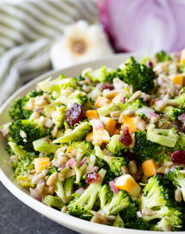 Fresh, crunchy broccoli salad tossed with sunflower seeds, cheese cubes, and dried cranberries, all coated in a tangy honey mustard dressing. Easy, make-ahead, and perfect for potlucks or healthy lunches!