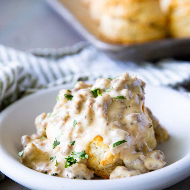 Sausage gravy, to be served over biscuits, a flavorful and simple breakfast idea.