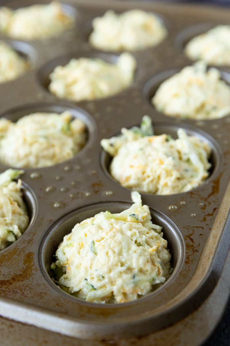 Unbaked cheesy zucchini muffins