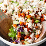 A hearty, flavor-packed salad with tender rotisserie chicken, roasted sweet potatoes, fresh greens, creamy feta, and a simple balsamic dressing. Perfect for an easy, nutritious meal.