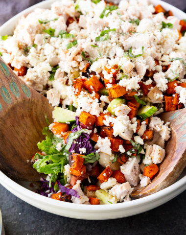 A hearty, flavor-packed salad with tender rotisserie chicken, roasted sweet potatoes, fresh greens, creamy feta, and a simple balsamic dressing. Perfect for an easy, nutritious meal.