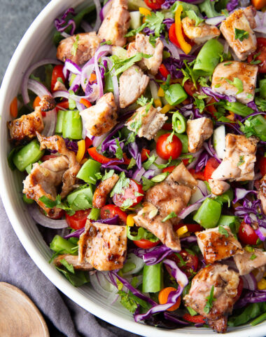 Fresh and flavorful BBQ Chicken Salad made with grilled chicken thighs, crisp veggies, and creamy homemade ranch dressing. Perfect for a hearty meal.