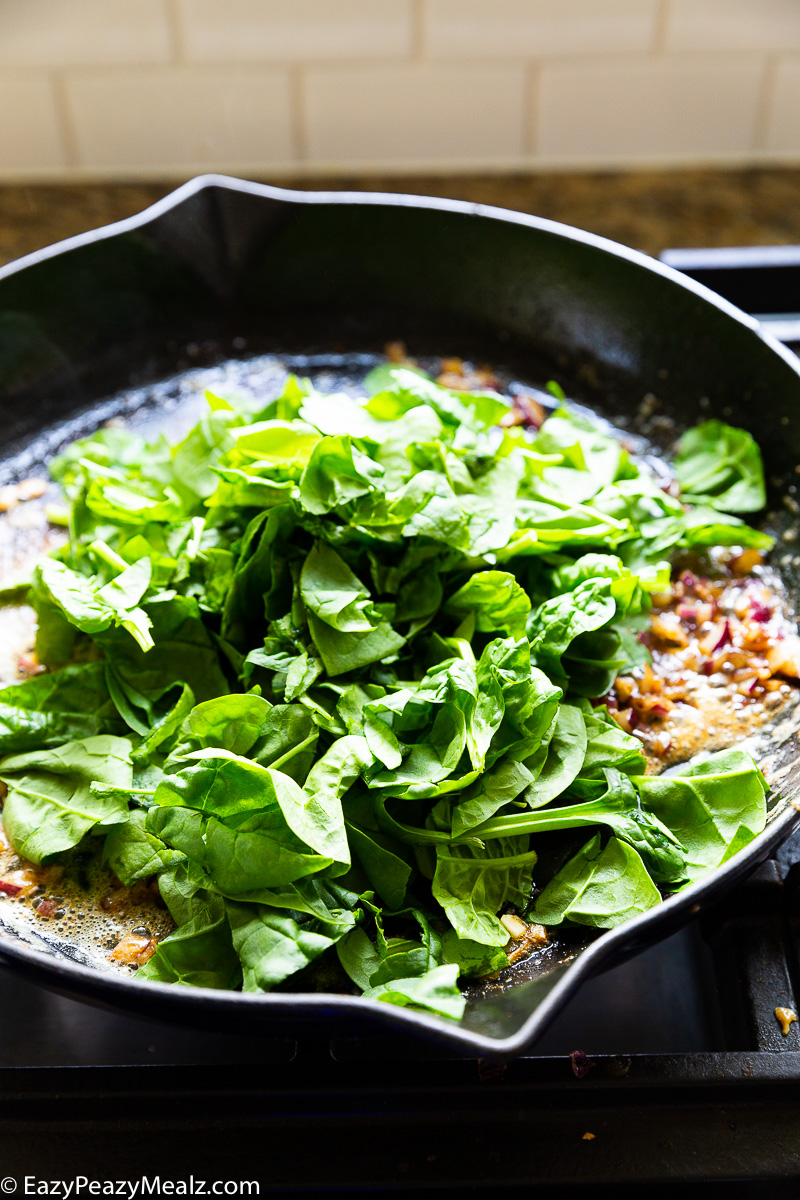 Making cajun salmon and shrimp cream sauce