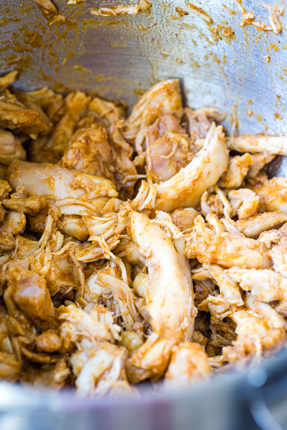 A bowl full of slow cooked salsa verde chicken