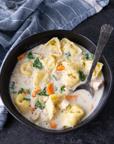 Slow Cooker Alfredo Chicken Tortellini Soup in a bowl