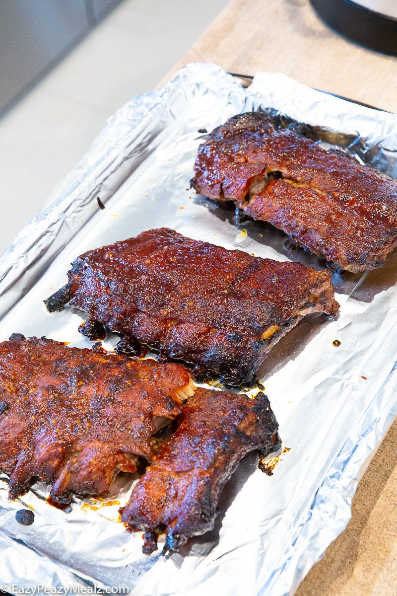 BBQ ribs cooked in the slow cooker and broiled to caramelized perfection.