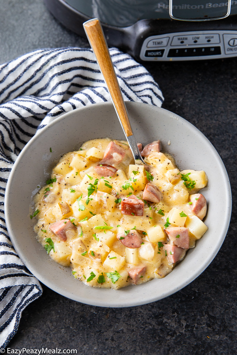 Slow cooker cheesy sausage and potatoes