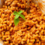 A slow cooker full of chicken pasta