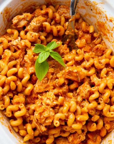 A slow cooker full of chicken pasta