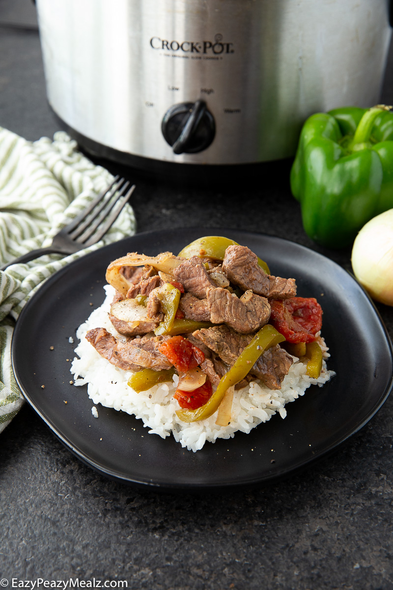 Slow cooker pepper steak cooked to tender perfection
