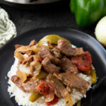 Slow cooker pepper steak cooked to tender perfection.