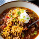 Slow Cooker Turkey Chili topped with amazing toppings.
