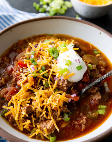 Slow Cooker Turkey Chili topped with amazing toppings.