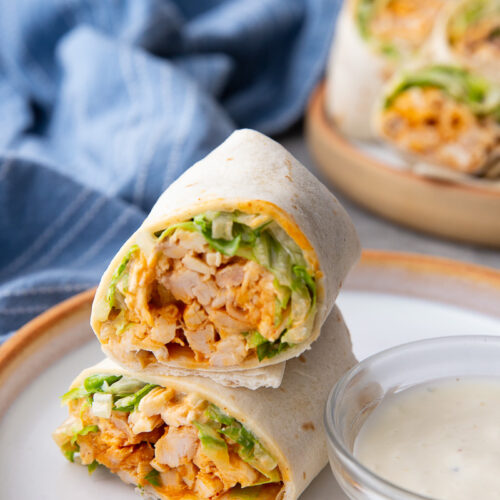 Spicy, creamy, and packed with fresh crunch, this Buffalo Chicken Wrap is an easy grab-and-go meal. Tender chicken, tangy buffalo sauce, ranch, and crisp veggies make it a quick, flavor-loaded lunch or dinner favorite.