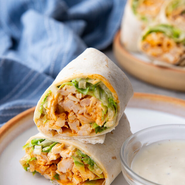 Spicy, creamy, and packed with fresh crunch, this Buffalo Chicken Wrap is an easy grab-and-go meal. Tender chicken, tangy buffalo sauce, ranch, and crisp veggies make it a quick, flavor-loaded lunch or dinner favorite.