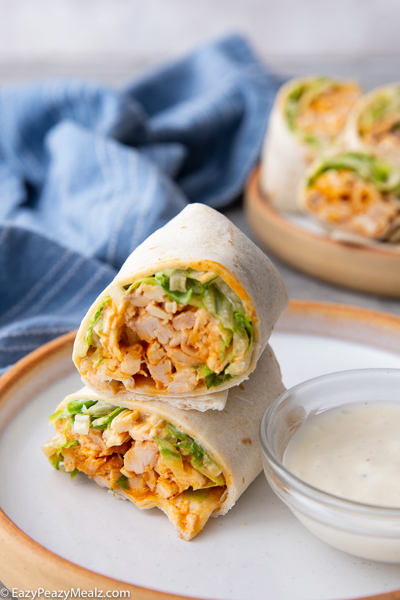 Spicy, creamy, and packed with fresh crunch, this Buffalo Chicken Wrap is an easy grab-and-go meal. Tender chicken, tangy buffalo sauce, ranch, and crisp veggies make it a quick, flavor-loaded lunch or dinner favorite.