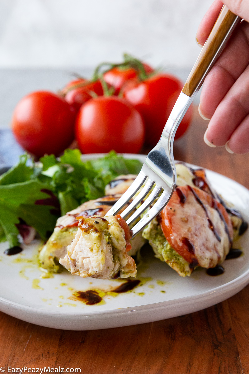 A bite of caprese chicken.