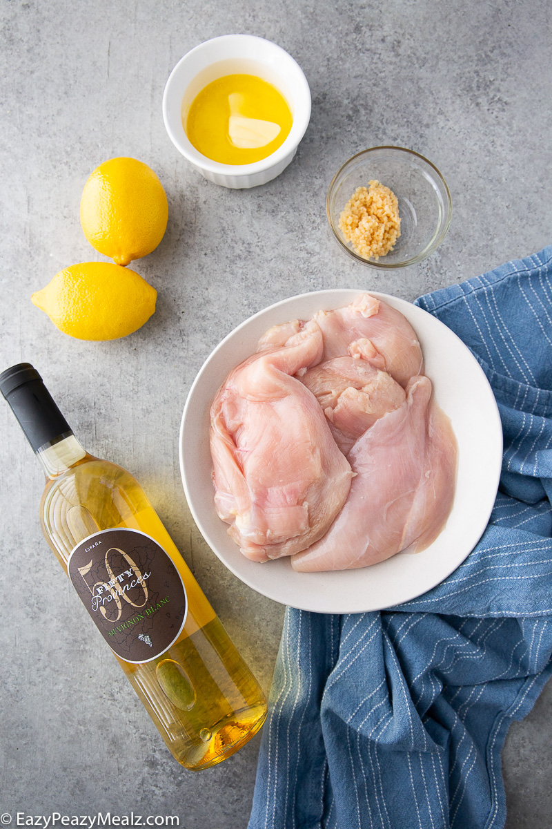 Ingredients needed for lemon garlic butter baked chicken breasts. 