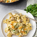 a plate of pest chicken pasta bake