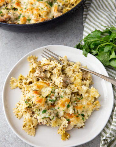 a plate of pest chicken pasta bake