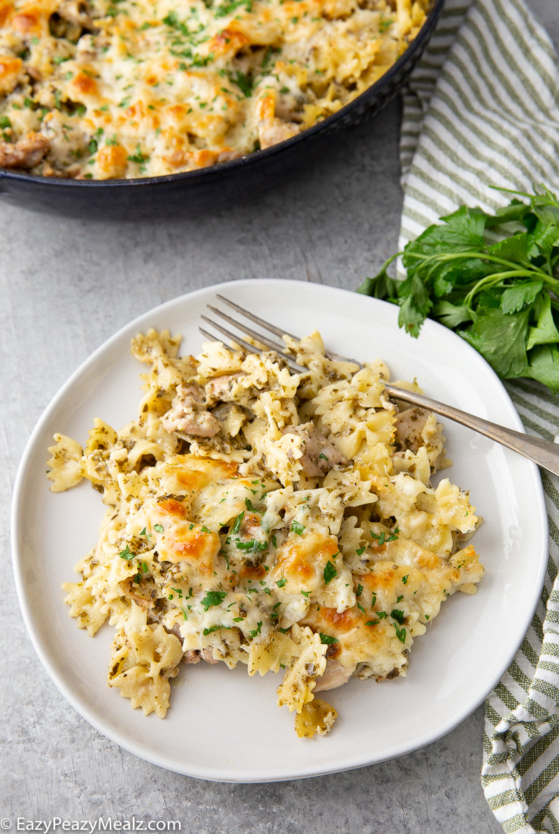 a plate of pest chicken pasta bake