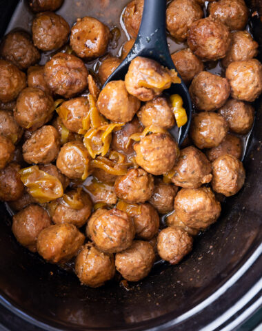 A slow cooker full of mississippi meatballs, tangy, tasty, and delicious.