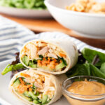 Thai peanut chicken wraps with a peanut dipping sauce.