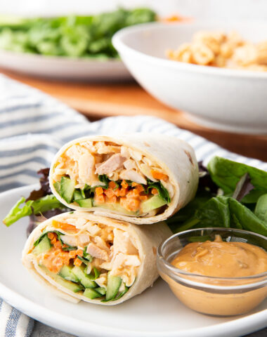 Thai peanut chicken wraps with a peanut dipping sauce.