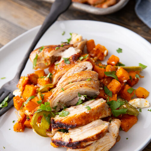 Sheet pan hot honey chicken with sweet potatoes feta and jalapenos