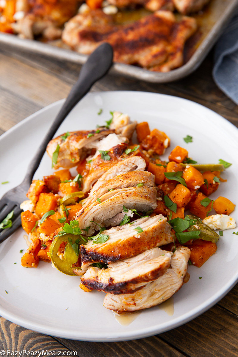 Sheet pan hot honey chicken with sweet potatoes feta and jalapenos