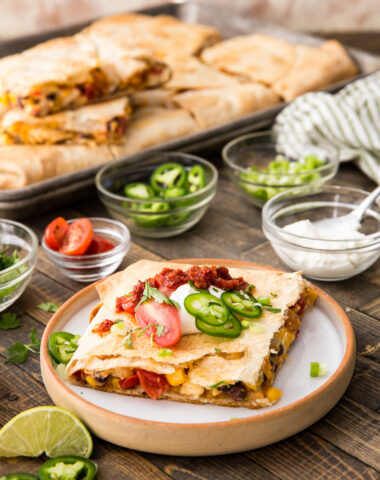 Easy sheet pan chicken quesadillas made for busy nights! Crispy tortillas, melty cheese, and chicken baked all at once—simple, customizable, family-friendly dinner.