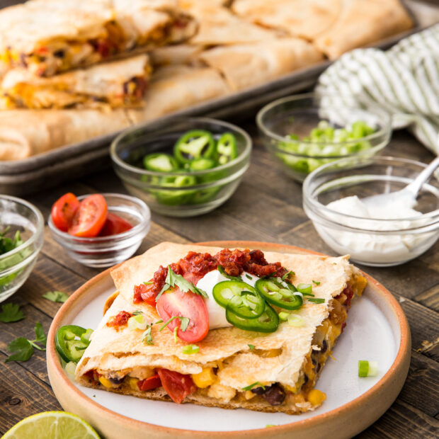 Easy sheet pan chicken quesadillas made for busy nights! Crispy tortillas, melty cheese, and chicken baked all at once—simple, customizable, family-friendly dinner.