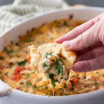 Marry Me Chicken Dip, a delicious cheese dip that is loaded with sun dried tomatoes, chicken, cheese, and more.